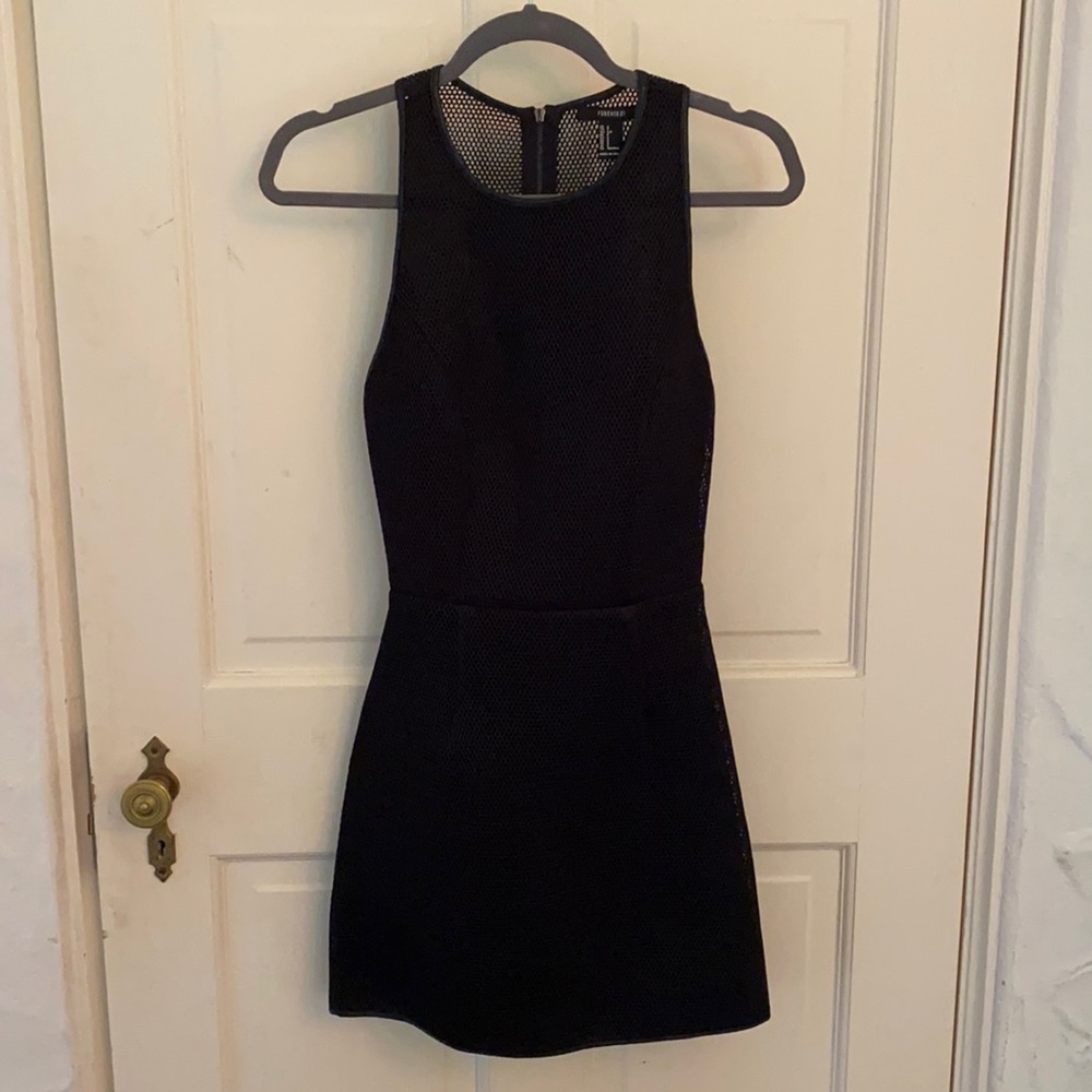 Black fishnet mini dress with back cutout